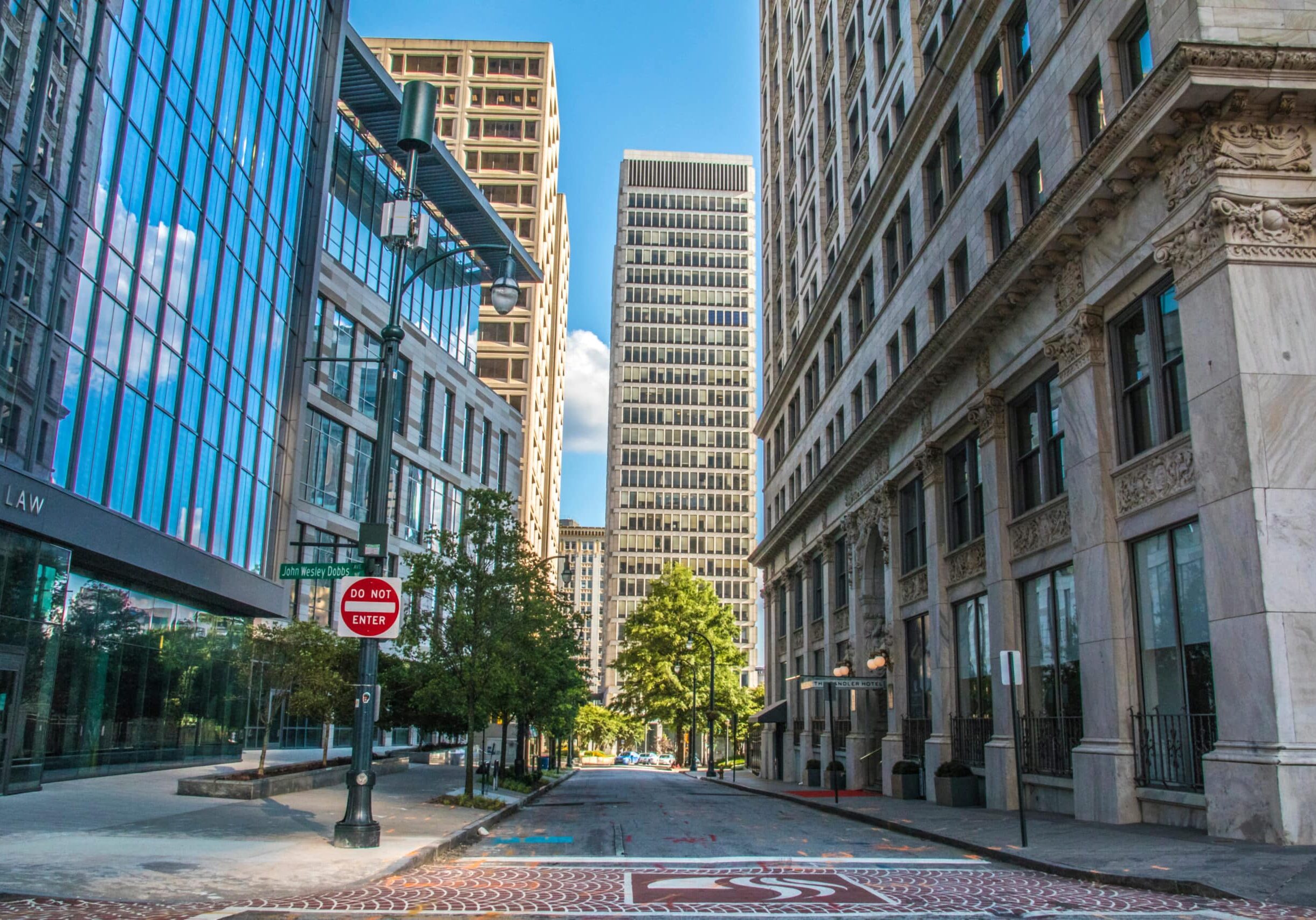 City Street with Modern and Historic Buildings in Sandy Springs, GA Downtown street lined with modern glass and historic stone buildings in the Atlanta suburb of Downtown Atlanta, Georgia.